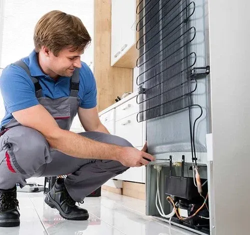 Ramson Appliances technician servicing an appliance in Howey-in-the-Hills, FL