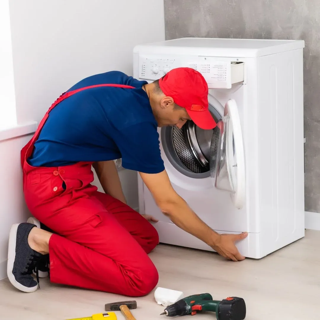Ramson Appliances technician servicing an appliance in Mascotte, FL