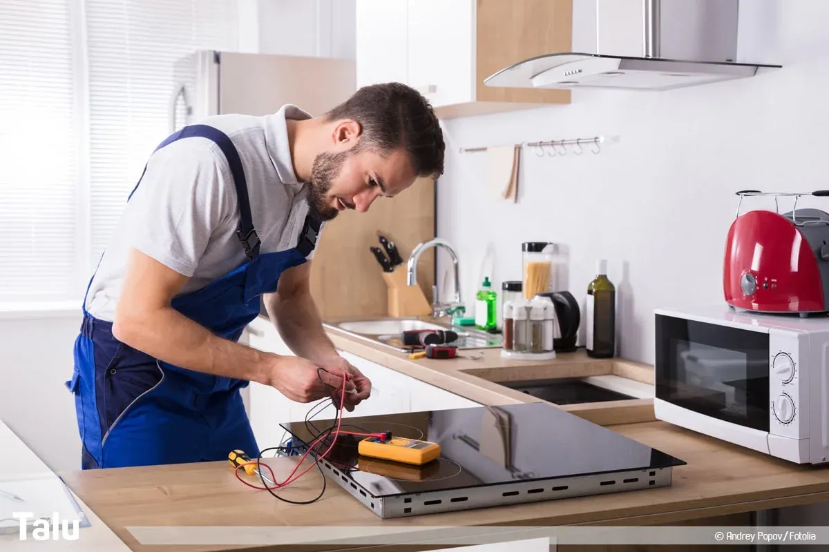Ramson Appliances technician repairing a home appliance in Minneola, FL