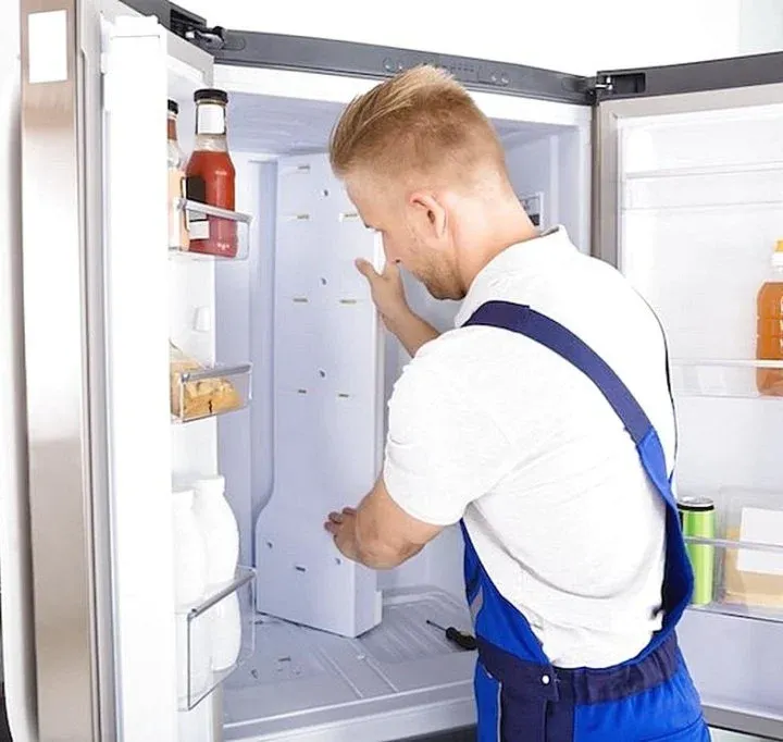 Ramson Appliances technician repairing an appliance at a home in Mascotte, FL