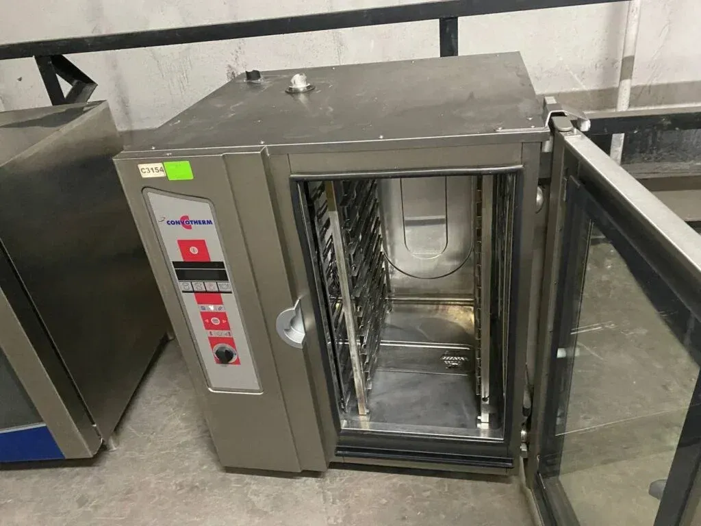 Convotherm combi oven with its door open, showing the empty rack cabinet