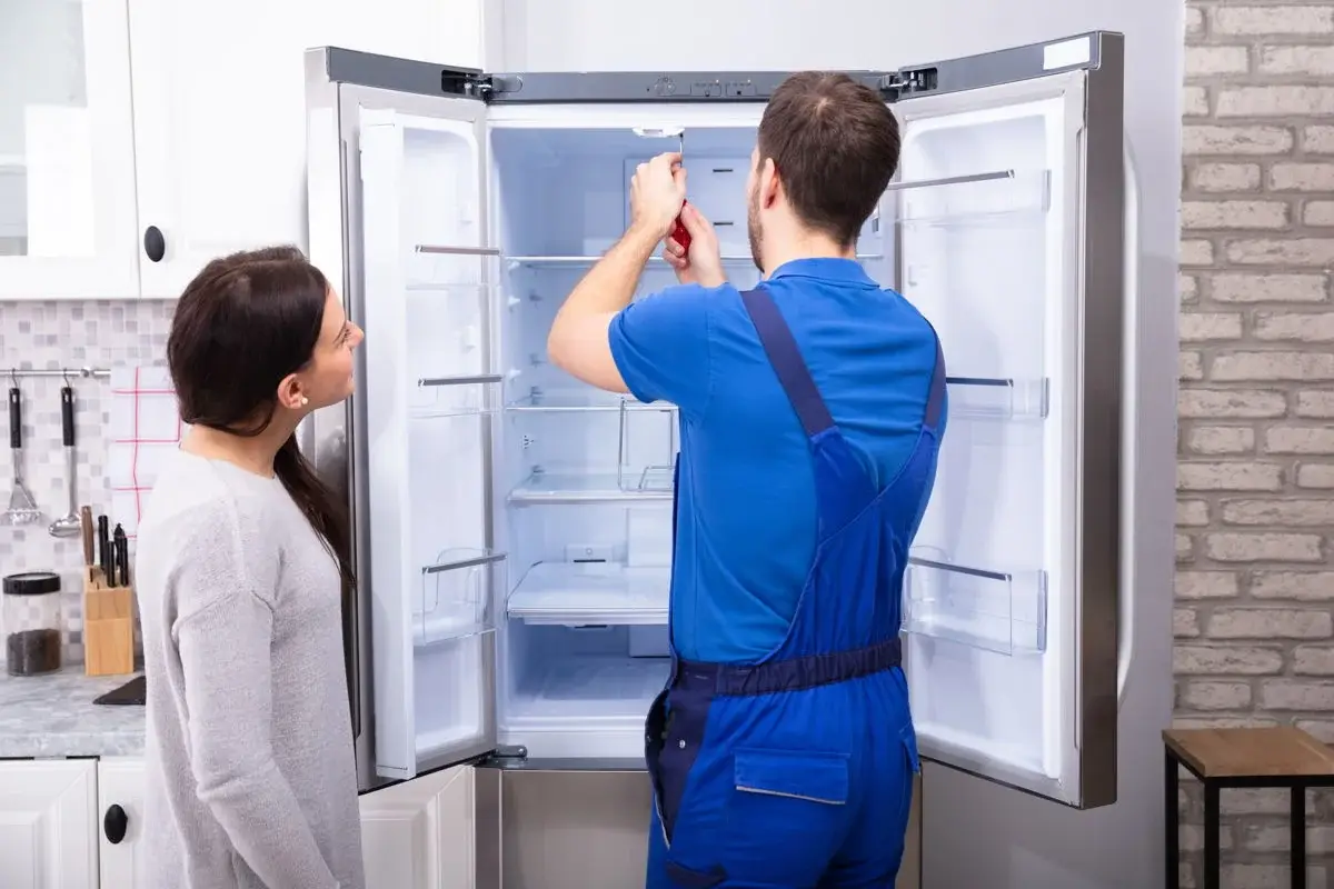 Ramson Appliances technician repairing a freezer in Groveland, FL
