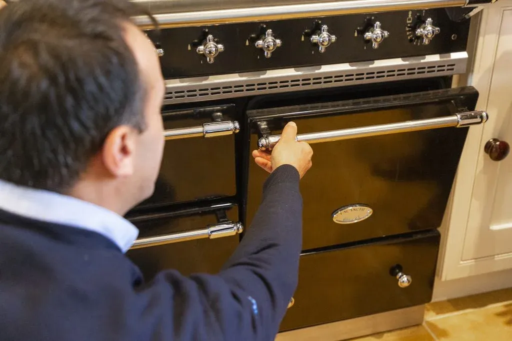 Ramson Appliances technician repairing a wall oven in Groveland, FL